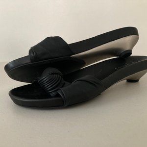 Italian black leather slide sandals with silver tone sole. Size 37 (6.5)